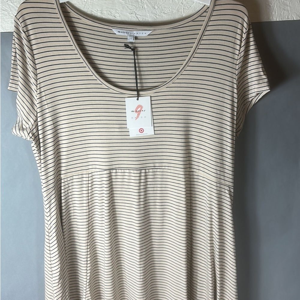 Women’s maternity dress off white.